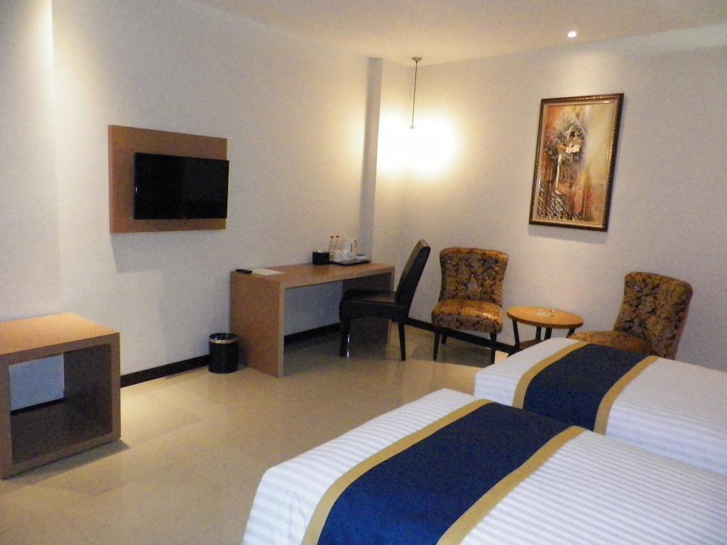 D'Best Hotel Pasar Baru Bandung Szoba fotó