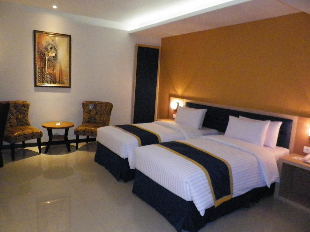 D'Best Hotel Pasar Baru Bandung Szoba fotó