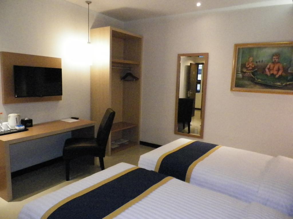 D'Best Hotel Pasar Baru Bandung Szoba fotó