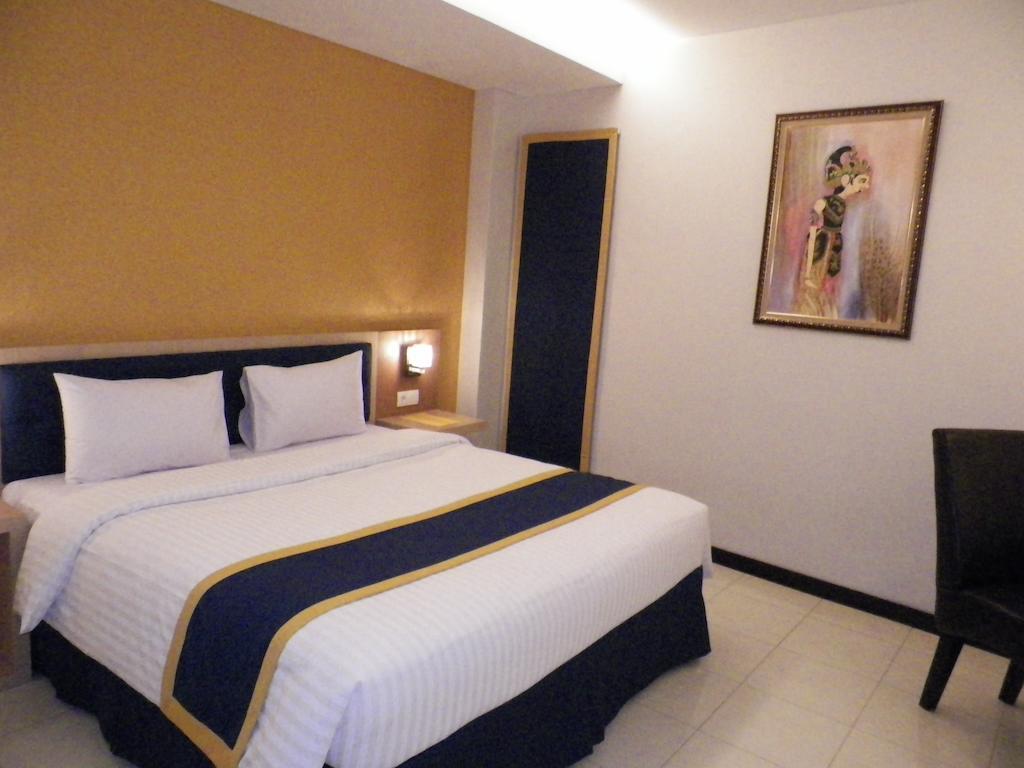 D'Best Hotel Pasar Baru Bandung Szoba fotó
