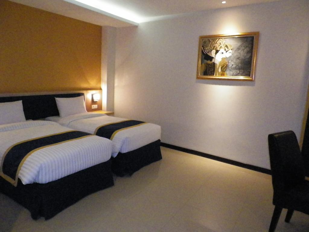 D'Best Hotel Pasar Baru Bandung Szoba fotó