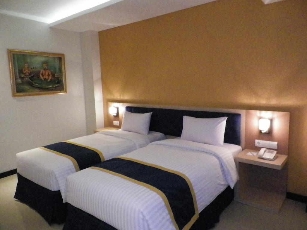 D'Best Hotel Pasar Baru Bandung Szoba fotó